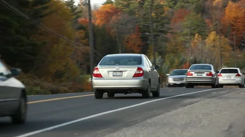 Driving out of city road Stock Footage