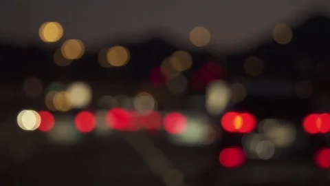 Driving out of focus lights on the highway, thoughtful mood Stock Footage 84239131