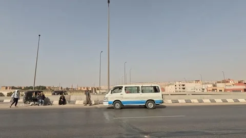 Driving the Outer Cairo Ring Road with Wide Views of the Expanding Capital City Video stock 329844611