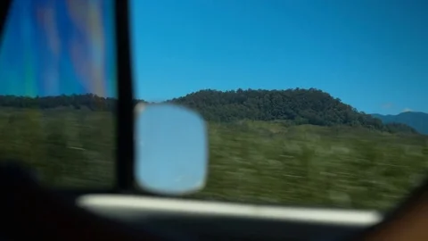 Driving Outside Car Window on Sunny Afternoon. Moving shot. Wideshot. Stock Footage 84885335
