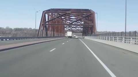 Driving over a bridge in Nebraska 스톡 동영상 84074880
