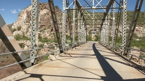 Driving over the Bridge over the Salt river which flows into Lake Roosevelt Stock Footage 209145719