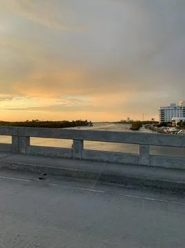 Driving over a bridge at sunset in Jupiter, Florida Stock Photos