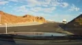Driving over the Hoover Dam after the bypass bridge opening. - 3 HD Footage