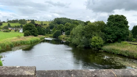 Driving over river Ribble bridge in Sawley village. 库存影片 303821874