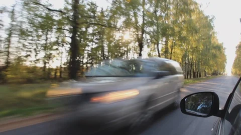 Driving, passage, driveway or transit of the black car in the autumn Stock Footage