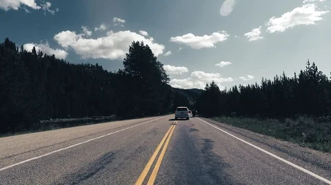 Driving passing through a Bison 2.7k Ultra HD gopro Stock Footage 98573672