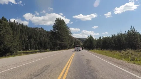 Driving passing through a Bison 2.7k Ultra HD gopro Stock Footage 98574071