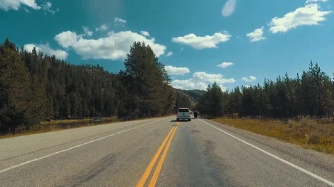 Driving passing through a Bison 2.7k Ultra HD gopro Stock Footage 98574983