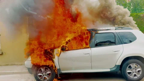 Driving past a burning car when the airbag exploded. Car accident on the road Stock Footage 320166246