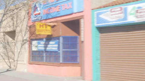 Driving Past Colorful Closed Border Town Store Fronts Stock Footage 60630662