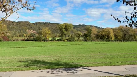 Driving Past Green Countryside Fields Video stock 320830691
