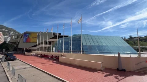 Driving Past Grimaldi Forum Monaco - Elevated Street View Stock Footage 346505795