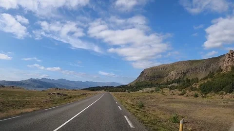 Driving past majestic basalt cliffs and mountain ranges in East Iceland Vídeos de archivo 333919595