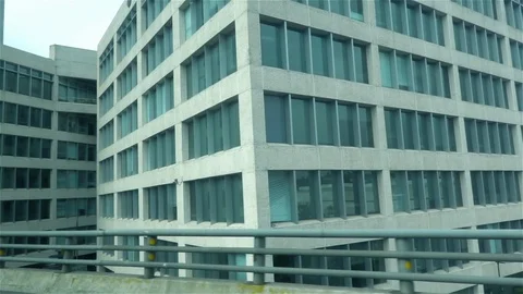 Driving past office building windows Stock Footage 124530393