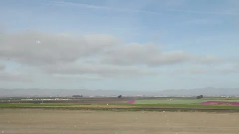 Driving past a slower field Stock Footage 155325516