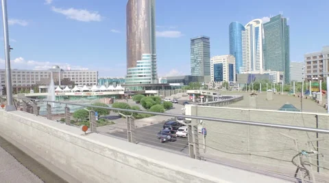 Driving past tall buildings in Astana Stock Footage 59556331