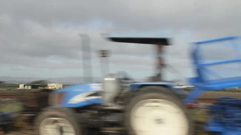 Driving past tractors Stock Footage 155325351