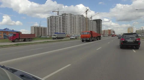 Driving past unfinished buliding site astana Stock Footage 59556276