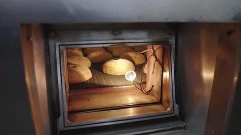 Driving past the window of the oven with bread Stock Footage 261525726