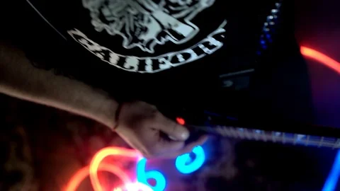 Driving performance on an electric guitar. cool color in the background Stock Footage 125355897