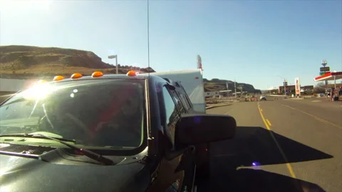 Driving, pickup pulls a trailer, RV, on Hwy 97, Oregon on a sunny day Stock Footage 167182924