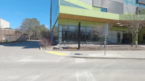 Driving plate of empty university and college campus in COVID pandemic Stock Footage 150483084