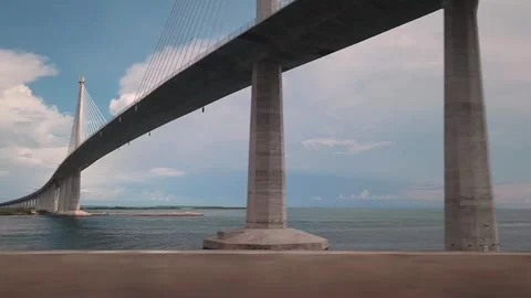 Driving plate going driving underneath CCLEX Bridge 動画素材 245589273
