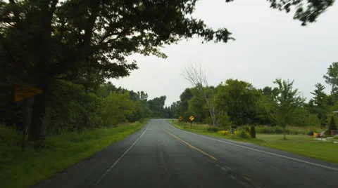 Driving plate: Mid West US rural road, rear view 4K Video stock 45453397