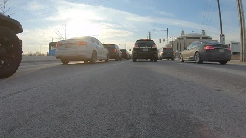 Driving plate POV low angle through the city of Toronto streets Stock Footage 101216462