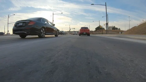 Driving plate POV low angle through the city of Toronto streets Stock Footage 101216667