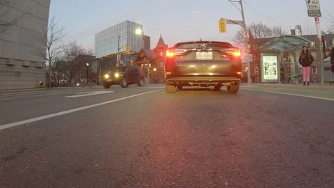 Driving plate POV low angle through the city of Toronto streets Stock Footage 101219958