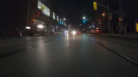 Driving plate POV low angle through the city of Toronto streets Stock Footage 101220516