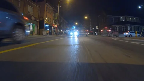 Driving plate POV low angle through the city of Toronto streets Stock Footage 101220732