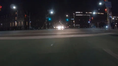 Driving plate POV low angle through the city of Toronto streets Stock Footage 101221028