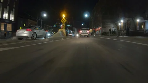 Driving plate POV low angle through the city of Toronto streets Stock Footage 101221177