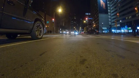 Driving plate POV low angle through the city of Toronto streets Stock Footage 101269861