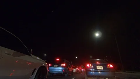 Driving plate POV low angle on Toronto city streets and highways at night Stock Footage 120149984