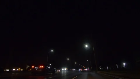 Driving plate POV low angle on Toronto city streets and highways at night Stock Footage 120151143