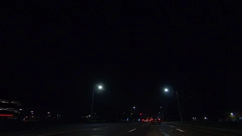 Driving plate POV low angle on Toronto city streets and highways at night Stock Footage 120151237