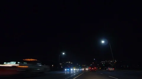 Driving plate POV low angle on Toronto city streets and highways at night Stock Footage 120152027