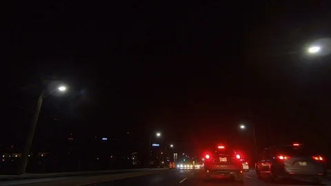 Driving plate POV low angle on Toronto city streets and highways at night Stock Footage 120152245