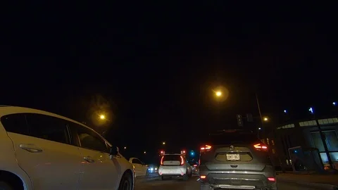 Driving plate POV low angle on Toronto city streets and highways at night Video stock 120153112