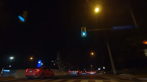 Driving plate POV low angle on Toronto city streets and highways at night Stock Footage 120153553