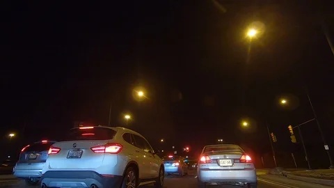 Driving plate POV low angle on Toronto city streets and highways at night Stock Footage 120154052