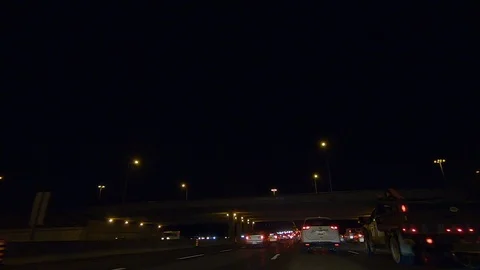 Driving plate POV low angle on Toronto city streets and highways at night Stock Footage 120155318
