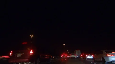 Driving plate POV low angle on Toronto city streets and highways at night Stock Footage 120155667
