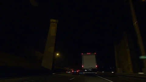 Driving plate POV low angle on Toronto city streets and highways at night Video stock 120158778