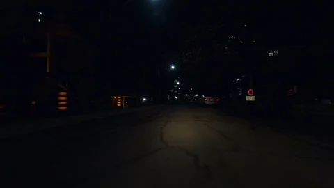 Driving plate POV low angle on Toronto city streets and highways at night Stock Footage 120158893
