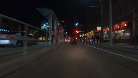 Driving plate POV low angle on Toronto city streets and highways at night Stock Footage 120160575